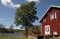 Rotes Schwedenhaus mit eigenem Strand 